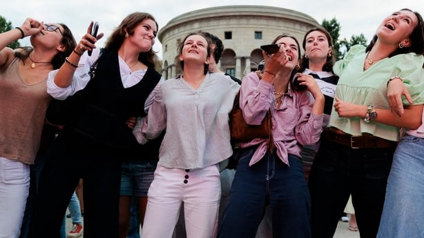 Fans take part in a massive karaoke event dedicated to Celine Dion at Place de la Bataille-de-Stalingrad in Paris, on 11 September, 2026. (Photo by Gauthier Bedrignans/Hans Lucas via AFP)
