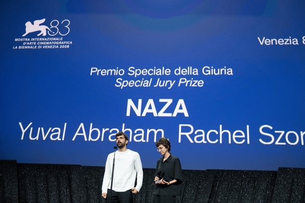 Yuval Abraham and Rachel Szor receive the Special Jury Prize Award for NAZA at the closing ceremony during the 83rd Venice International Film Festival on 12 September, 2026. (Photo by Laurent Hou/Hans Lucas via AFP)