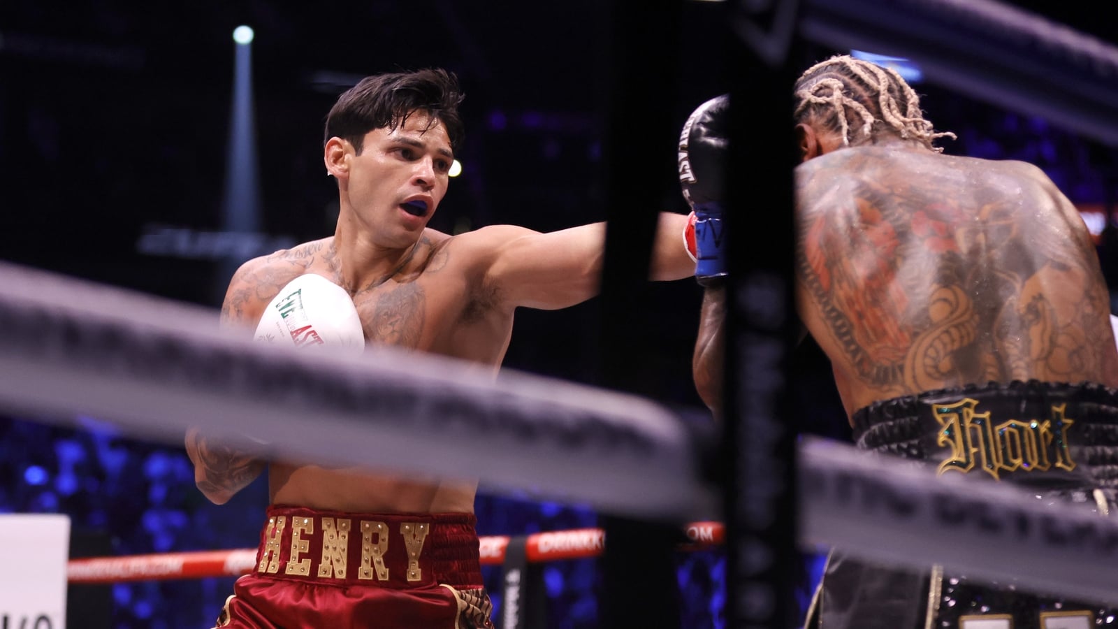Garcia knocks out Benn to retain world welterweight title