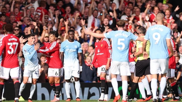 Phil Foden of Manchester City reacts after receiving a red card from Referee Michael Oliver during the Premier League 2026/27 match between Manchester United and Manchester City at Old Trafford on September 13, 2026 in Manchester, England.
