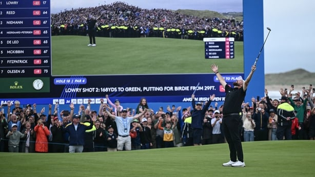 Shane Lowry celebrates his victory on the final hole of the Irish Open golf tournament.