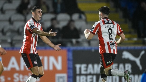 14 September 2026; Adam O'Reilly of Derry City celebrates after scoring his side's first goal with team-mate Darragh Burns during the SSE Airtricity Men's Premier Division match between Waterford and Derry City at the RSC in Waterford. Photo by Eakin Howard/Sportsfile