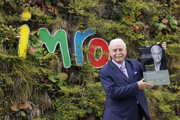 RTE braodcaster accepting award