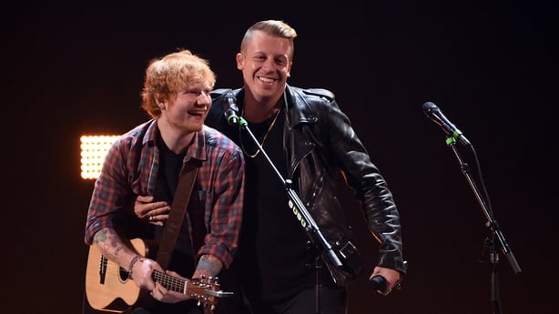Ed Sheeran and Macklemore perform during the 2014 iHeartRadio Music Festival at the MGM Grand Garden Arena on 20 September, 2014 in Las Vegas. (Photo by Ethan Miller/Getty Images for iHeartMedia)