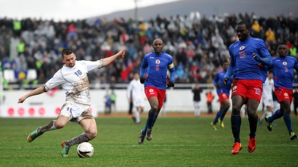 Kosovo's Albert Bunjaku controls the ball in front of Haiti's Kevin La France during the friendly football match between Kosovo and Haiti on March 5, 2014 in Mitrovica. Six years after declaring independence from Serbia, Kosovo drew 0-0 in a friendly match with Haiti in their FIFA-approved debut on