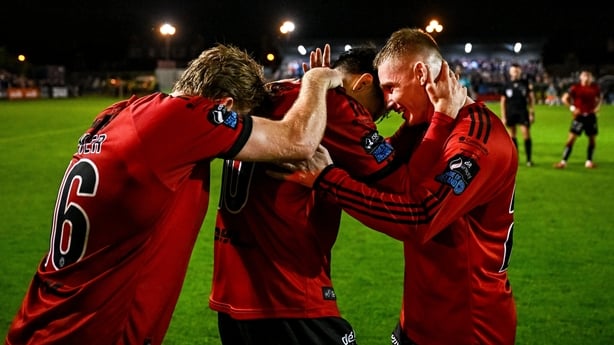 Dawson Devoy, centre, is congratulated by team-mates Darragh Power, left, and Ross Tierney