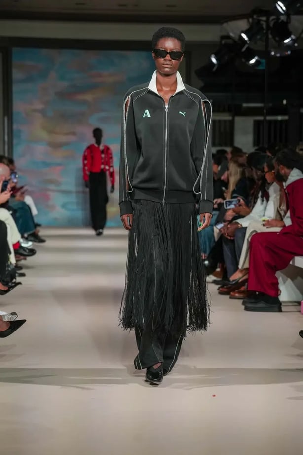 A black Ahluwalia X Puma tracksuit complete with fringe