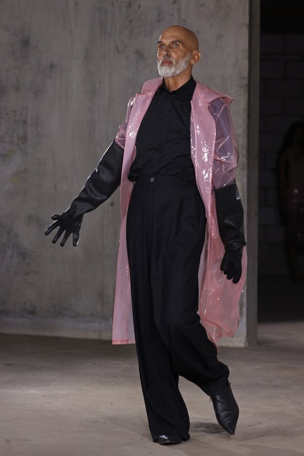 model walks the runway at the Natasha Zinko show