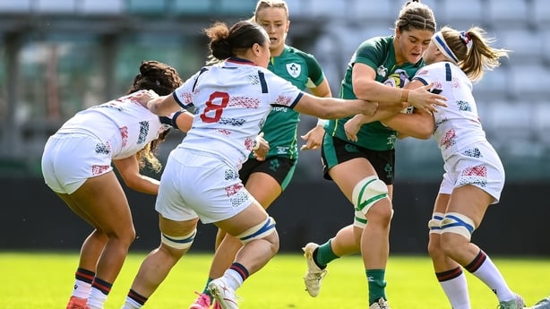 20 September 2026; Jemima Adams Verling of Ireland is tackled by Freda Tafuna and Georgie Perris-Redding of USA during the WXV Global Series match between Ireland and USA at Tallaght Stadium in Dublin. Photo by Stephen McCarthy/Sportsfile