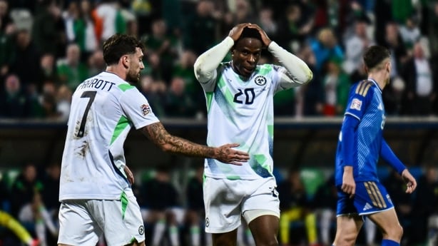 Chiedozie Ogbene of Republic of Ireland reacts to a missed opportunity on goal, as he is consoled by team-mate Troy Parrott, left, during the UEFA Nations League B match between Kosovo and Republic of Ireland at Fadil Vokrri Stadium in Pristina, Kosovo.