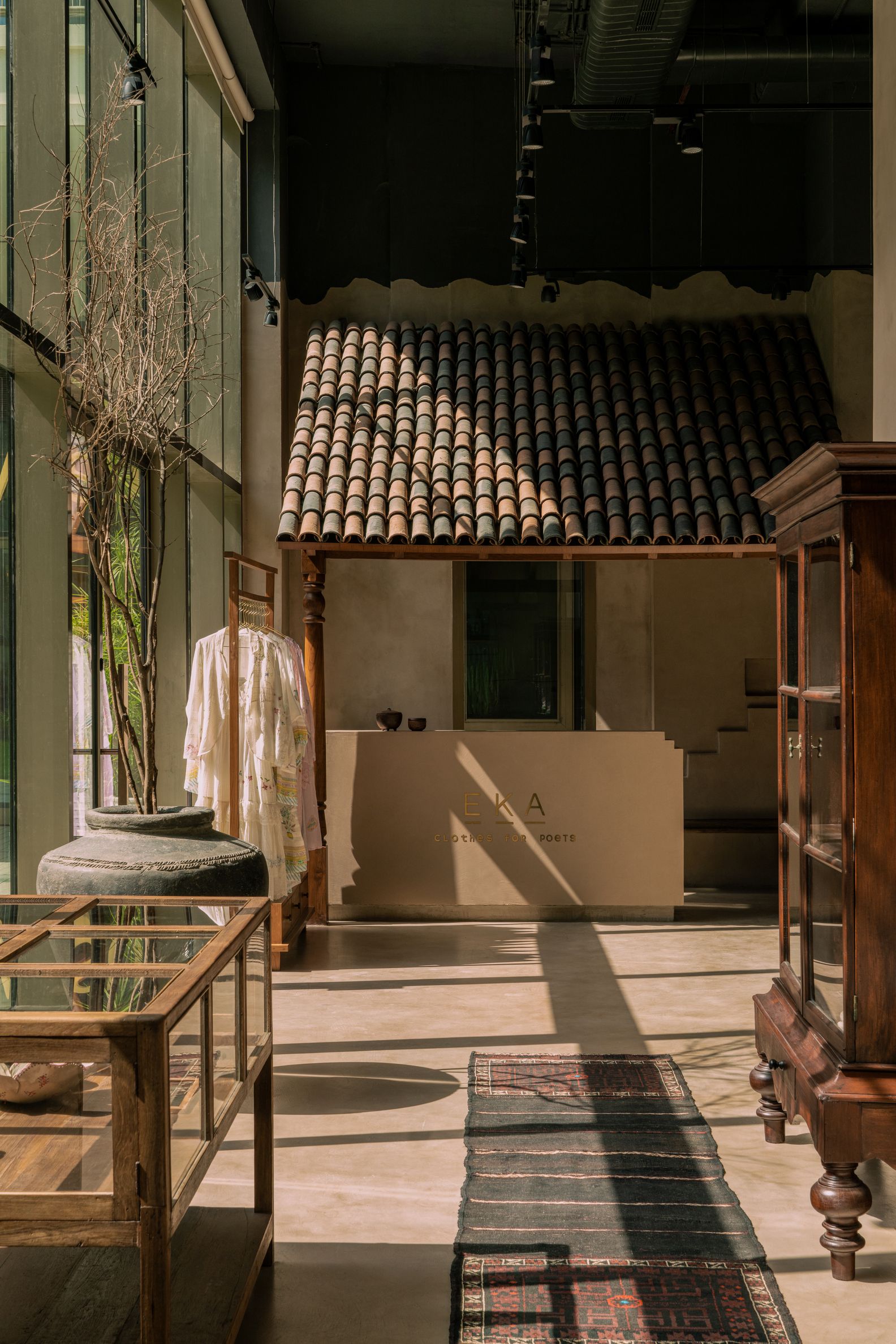 Image may contain Indoors Interior Design Architecture Building Housing Plant Floor and House