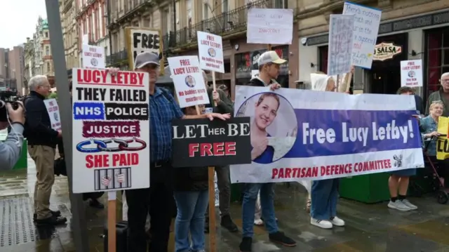 Letby's supporters holding placards near Liverpool Town Hall earlier