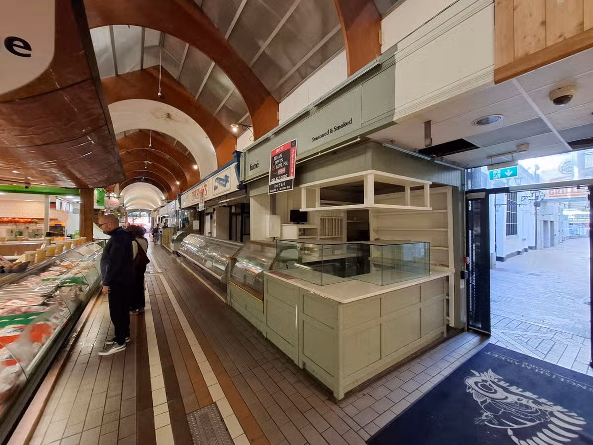 Empty stalls in the English Market