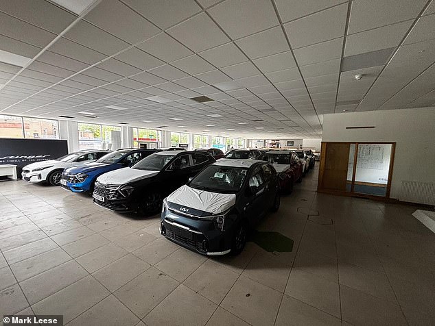 The Kia showroom in Coatbridge, Scotland before being turned into Arctic station interior set for BBC filming of Vigil