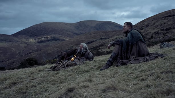 Hugh Jackman as Robin and Bill Skarsgård as Edward make plans in the great wide open