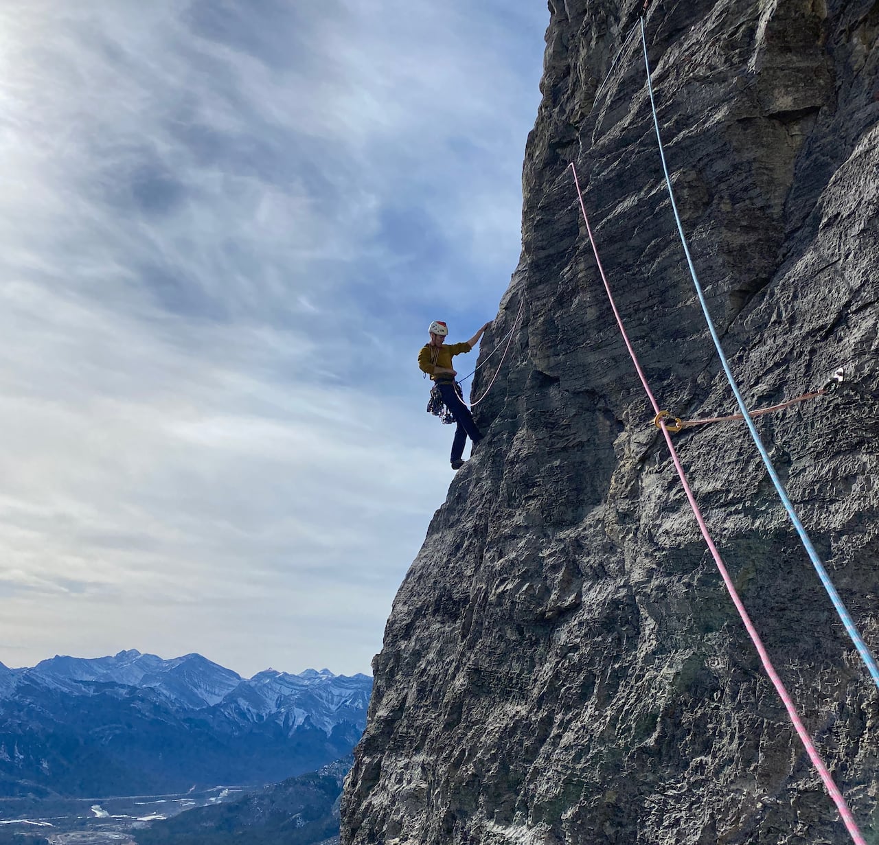 A man climbs a mountain