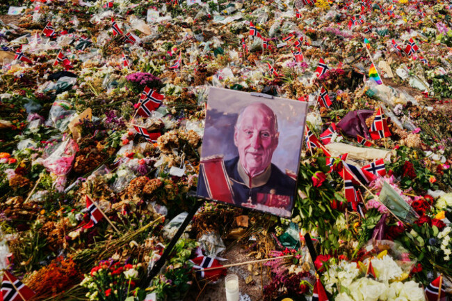 a-painting-of-norways-late-king-harald-stands-in-floral-tributes-at-the-palace-square-at-the-eve-of-his-funeral-in-oslo-norway-tuesday-sept-8-2026-ap-photomarkus-schreiber