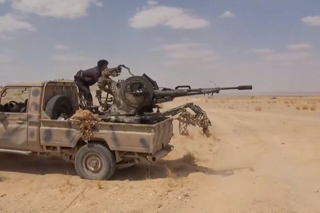 this-image-taken-from-undated-video-released-by-the-ansar-allah-media-office-the-media-arm-of-yemens-houthi-rebels-on-wednesday-sept-9-2026-shows-a-houthi-fighter-firing-a-truck-mounted-anti-ai