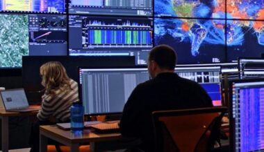 analysts work at computer stations