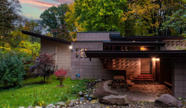 cantilevered roof extends over frank lloyd wright’s concrete usonian house