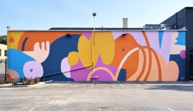 a colorful, abstract mural on a wall by Emmy Star Brown
