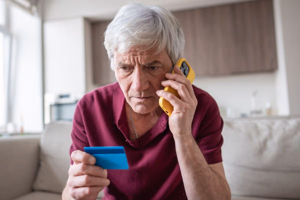 A man checks his finances