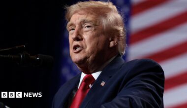 U.S. President Donald Trump delivers remarks at Red Rock Casino Resort Spa in Las Vegas, Nevada, U.S., August 5, 2026. It is a head-and-shoulders shot and he is wearing a blue jacket and shiny red tie.