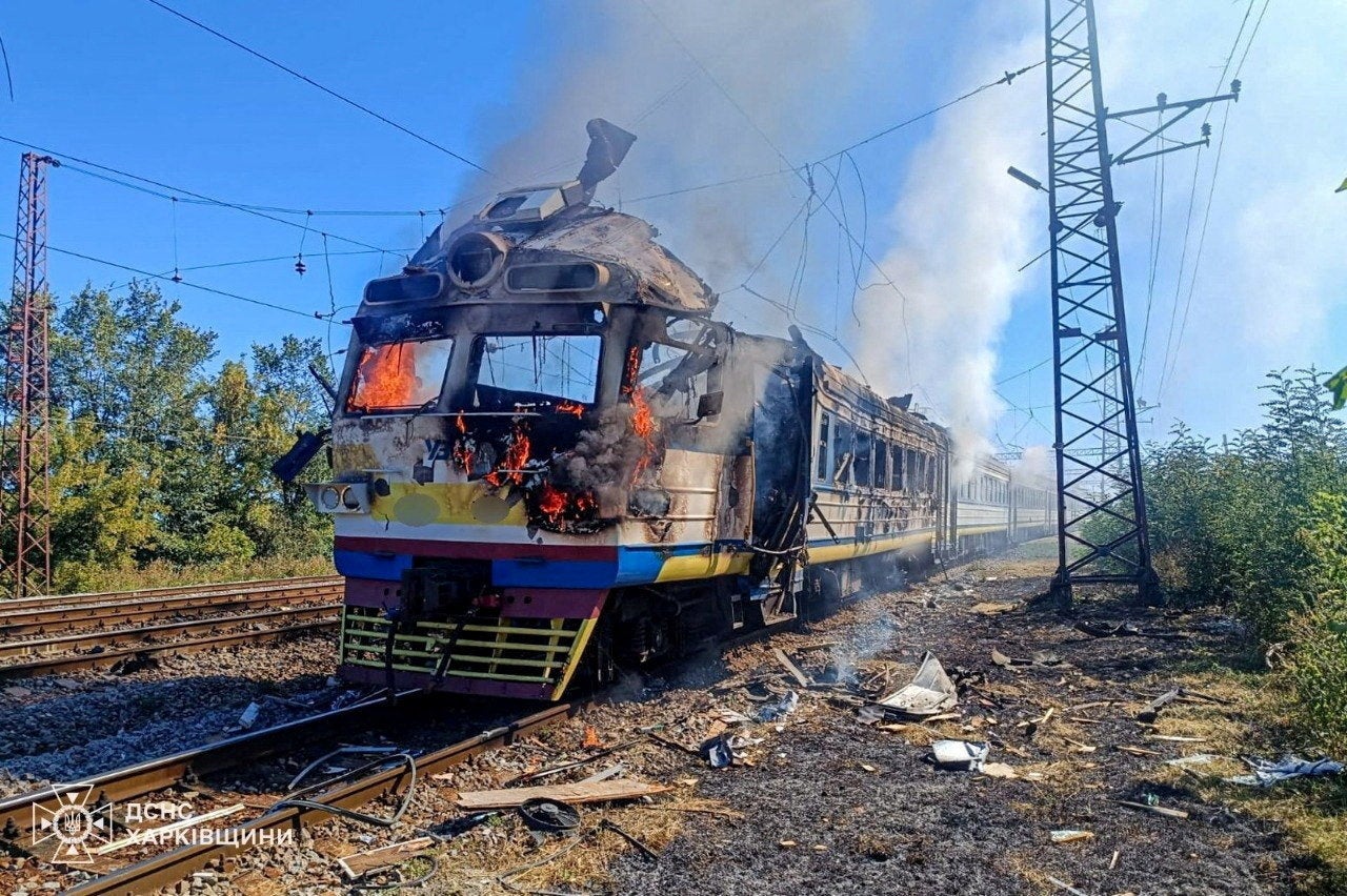 A locomotive of a passenger train burns following a Russian drone strike, amid Russia's attack on Ukraine, in Kharkiv region, Ukraine, September 9