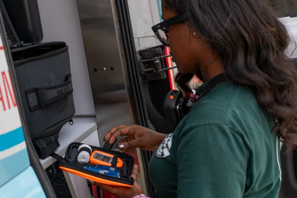 EMT Simone Nelson checks that the medical bag packed in the CARE van is stocked with all necessary supplies fear heading out on a shift on Sept. 14, 2026.