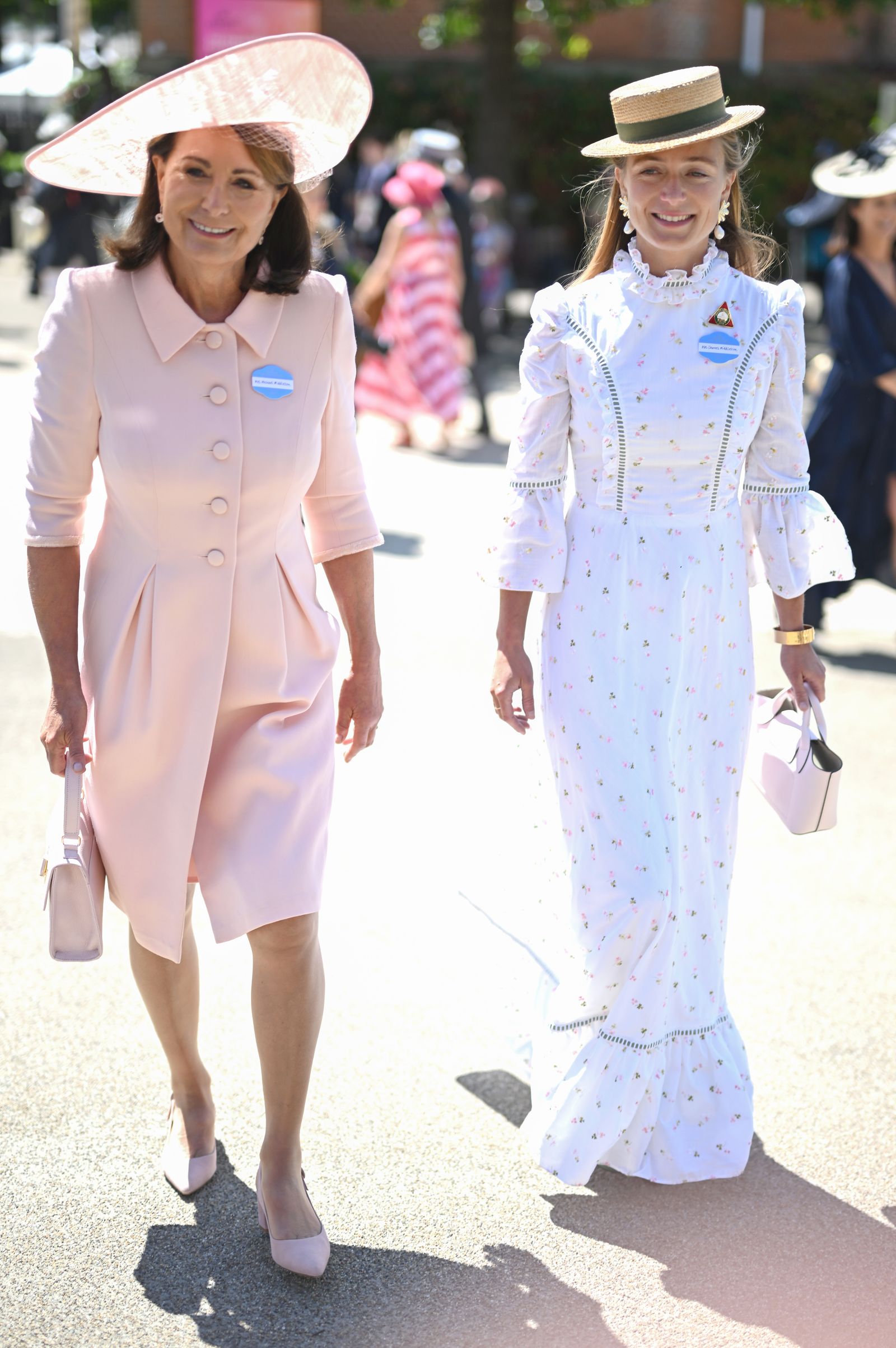 Image may contain Carole Middleton Jutta Kleinschmidt Person Adult Accessories Bag Handbag Clothing Hat and Coat