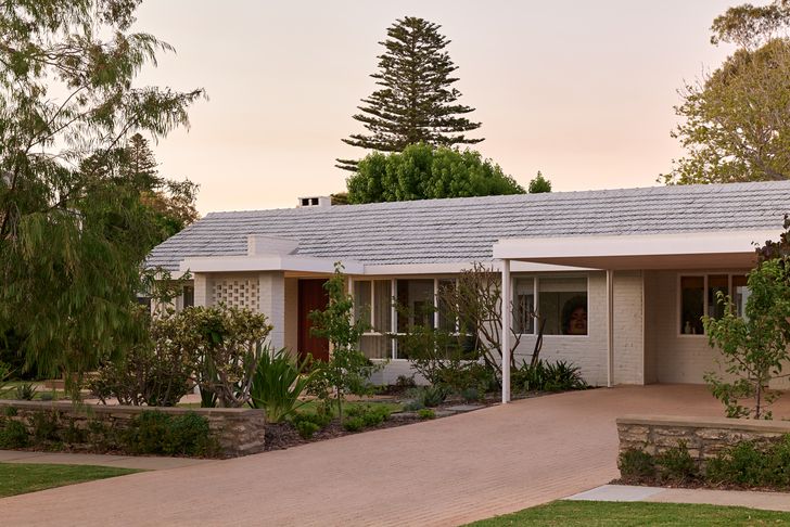 The modest, low-slung form of the existing house has been preserved.
