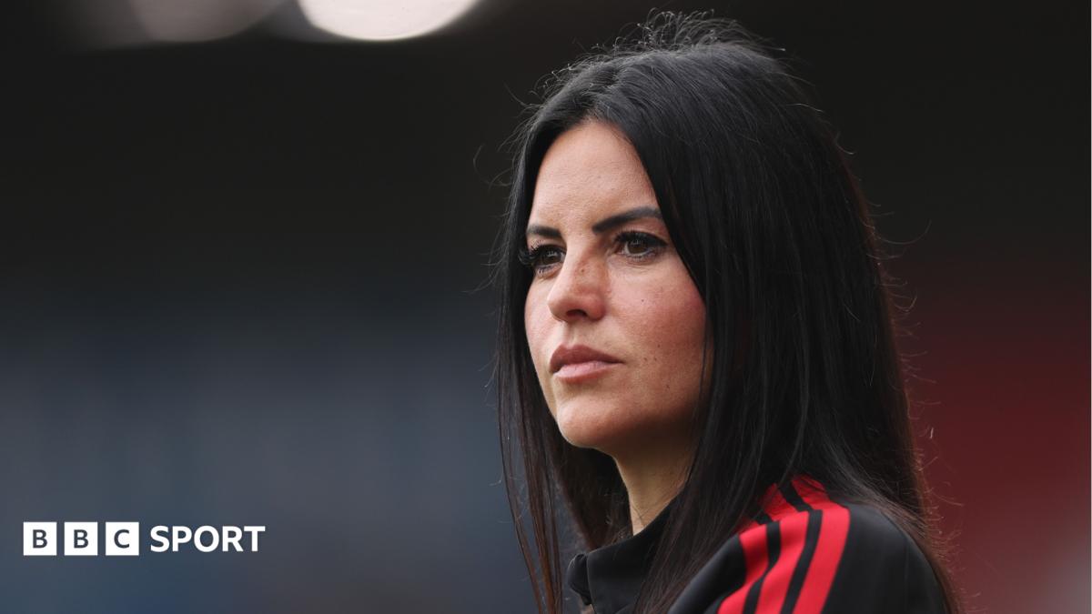Manchester United manager Eva Olid looks on during the Women's Super League against Chelsea