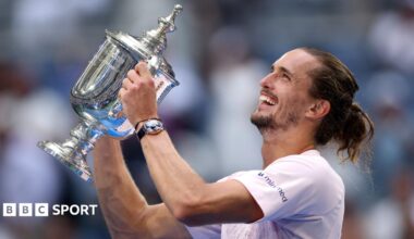 Alexander Zverev celebrates with the US Open trophy