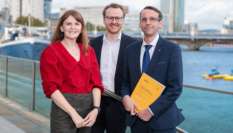 Economy Minister Dr Caoimhe Archibald pictured with Sam Donaldson (centre), who authored the new AI report, and AICC director David Crozier.