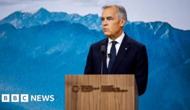 Canada is a 'safe harbour' for global finance, Carney says - BBC