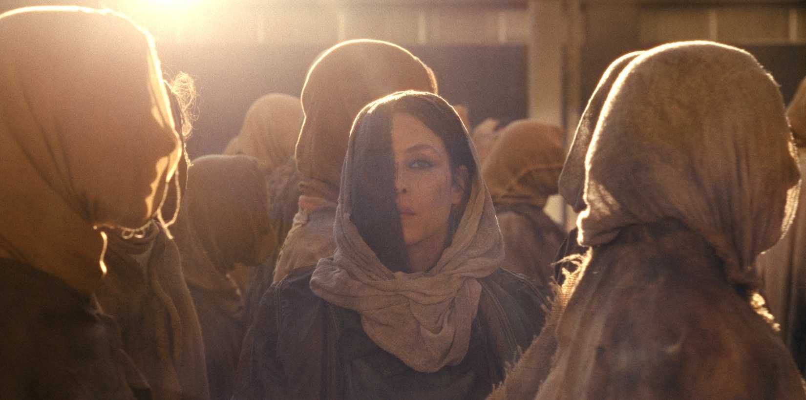 Noomi Rapace in a head scarf/covering in Hot Spot