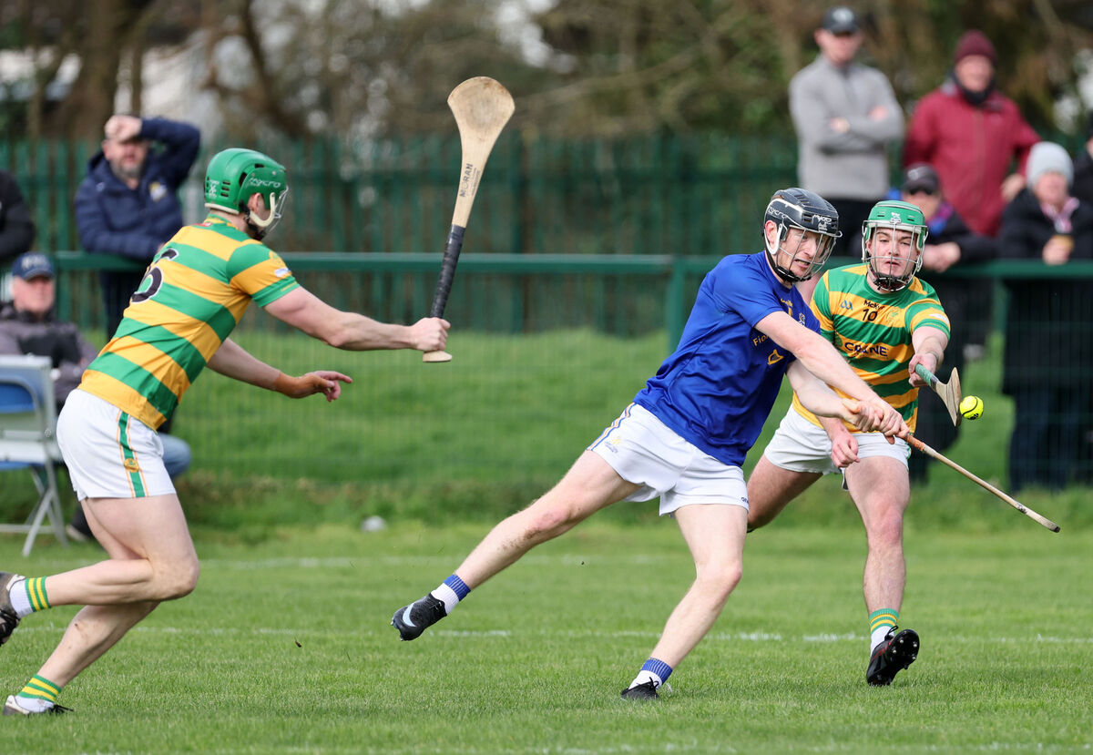  Jack Cahalane, St Finbarr's, shoots from John Cashman and Peter Lenihan, Blackrock. He has suffered another hamstring injury which will rule him out for the rest of the season. Picture: Jim Coughlan.