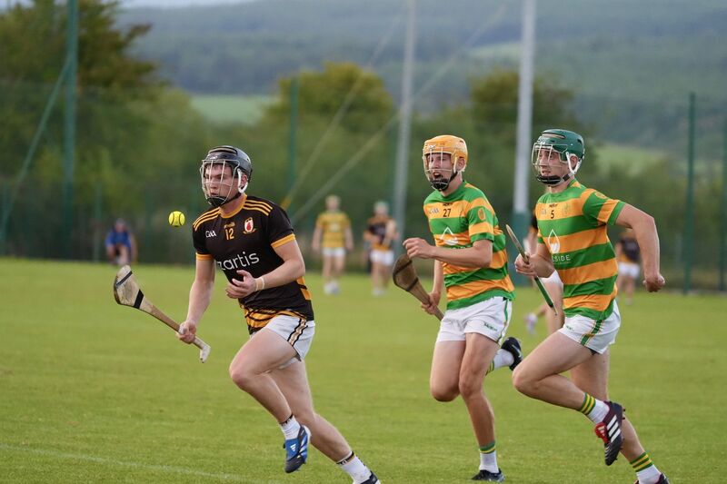 Na Piarsaigh’s Craig O’Sullivan drives towards goal, chased by Blackrock pair Patrick McCarthy and Ollie Walsh. Picture: Noel Sweeney