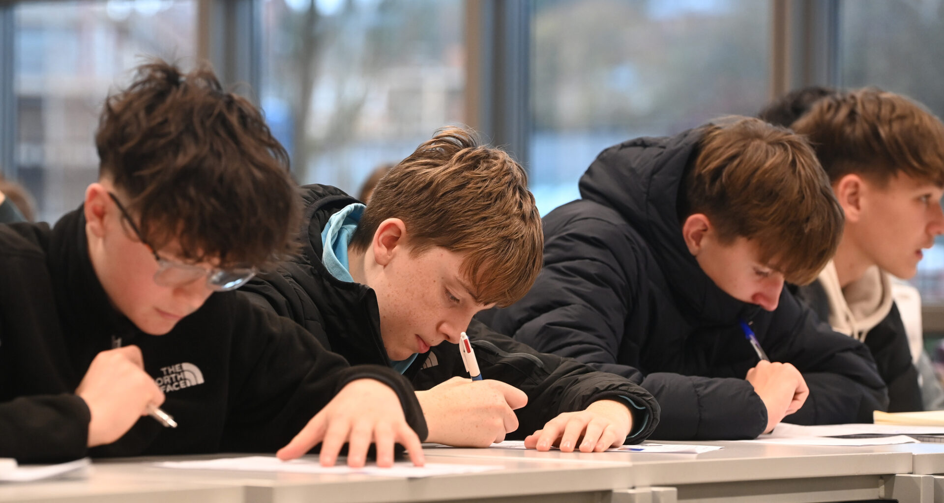 Junior students concentrate on maths challenegs set at maths enrichment classes at UCC. Picture: Larry Cummins