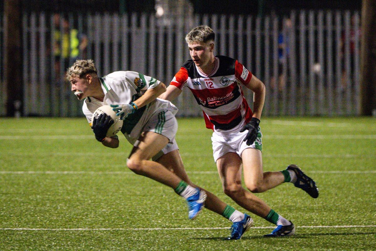 Ballincollig’s Faolán O’Leary chases Macroom’s Darragh Creed. Picture: Chani Anderson
