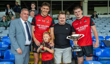From left: Patrick O’Sullivan, Chairman of Kerry GAA, Man of the Match David Clifford with his son Ogie, Mike Tagney of Kerry Petroleum and Fossa captain Sam Buckley with the cup following their victory over Kilcummin in the Kerry Petroleum Intermediate Club Football Championship final at Fitzgerald Stadium on Sunday. Photo: Tatyana McGough.