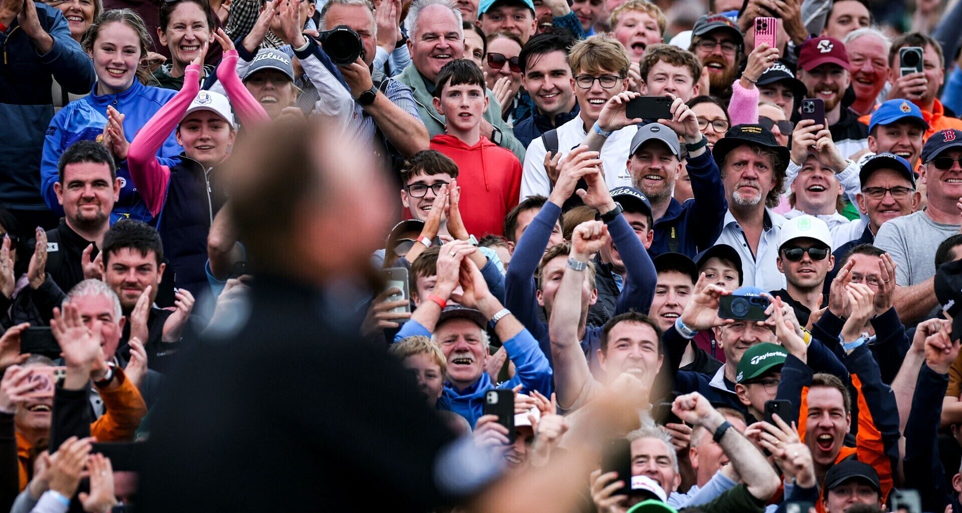 Fans celebrate Shane Lowry winning. Pic: Dan Clohessy/Inpho