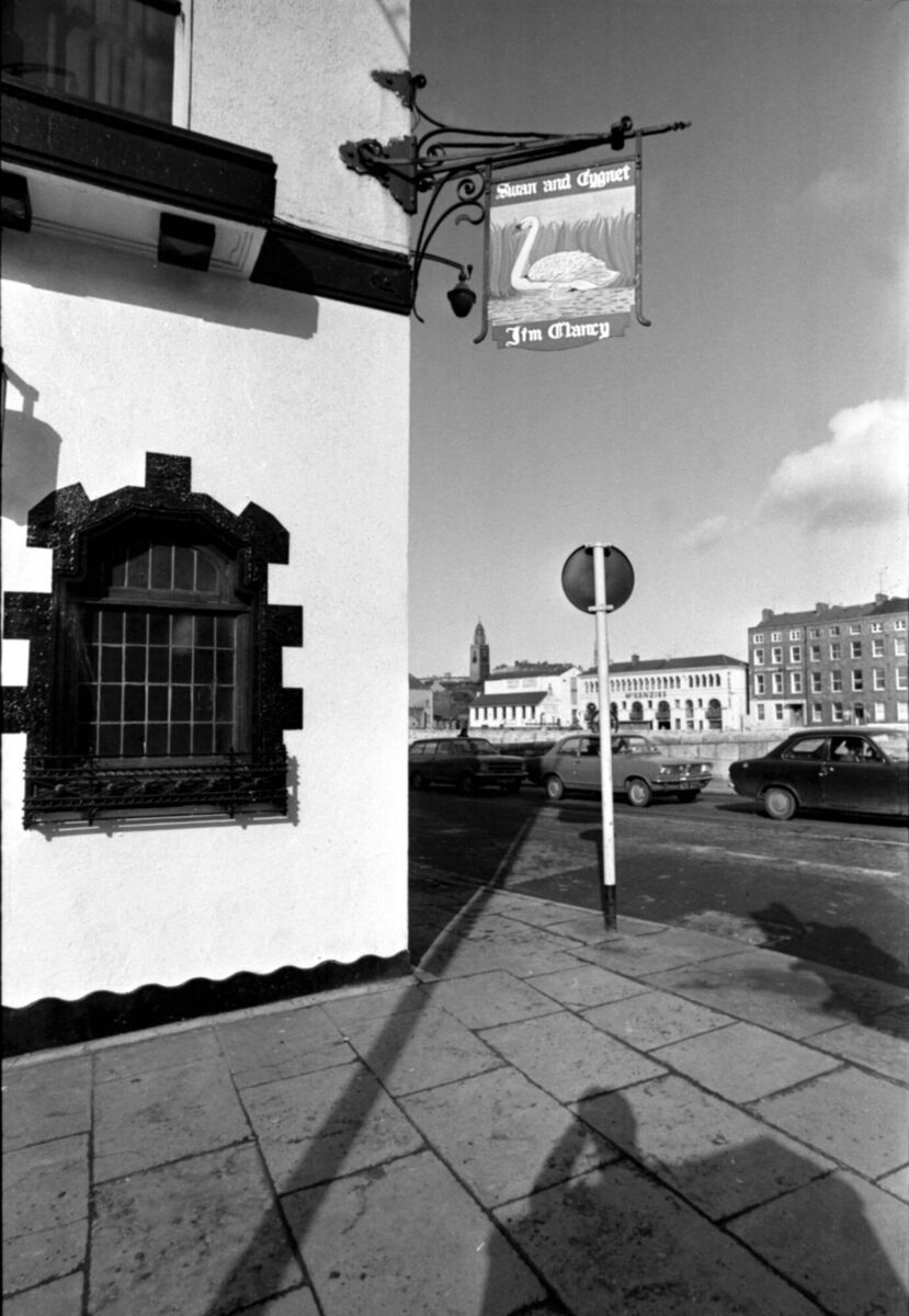 A sign for The Swan And Cygnet bar in Patrick Street, Cork, in March, 1975, including the name of the landlord Jim Clancy