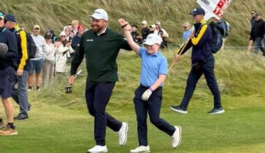 Athenry's Cillian Hirst with newly minted Amgen Irish Open champion Shane Lowry at Doonbeg.