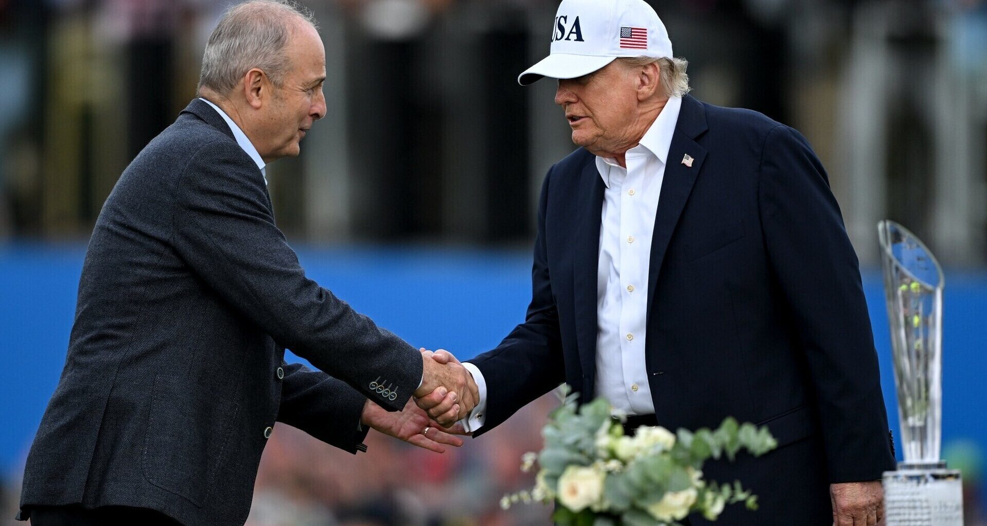 Taoiseach Micheál Martin and US president Donald Trump shake hands during day four of the Amgen Irish Open Golf Championship 2026 at Trump International Golf Links in Doonbeg, Co Clare. Picture: Ramsey Cardy/Sportsfile