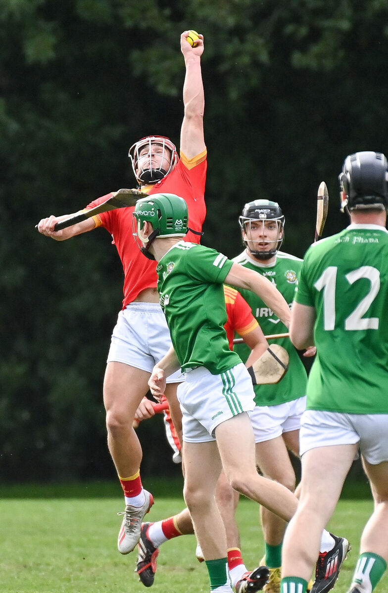  Mallow's Paul Lyons goes high to win possession against Aghada. Picture: David Keane.
