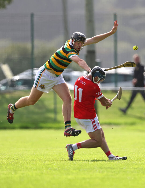  Eoin Downey of Glen Rovers tries to block a shot by Seán Bresnan of Charleville. Picture: Jim Coughlan