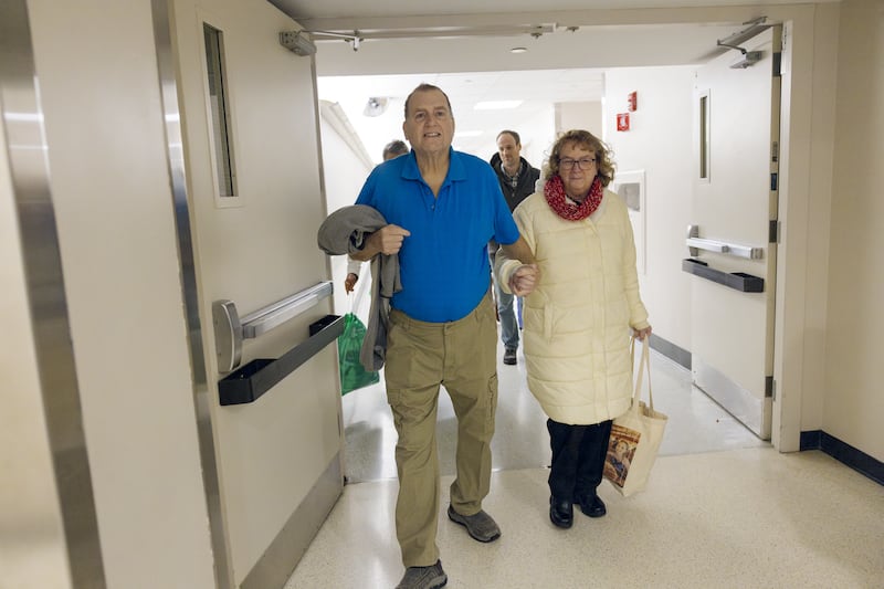 Mr Andrews leaves Massachusetts General Hospital with his wife, Karen, on February 1 2025