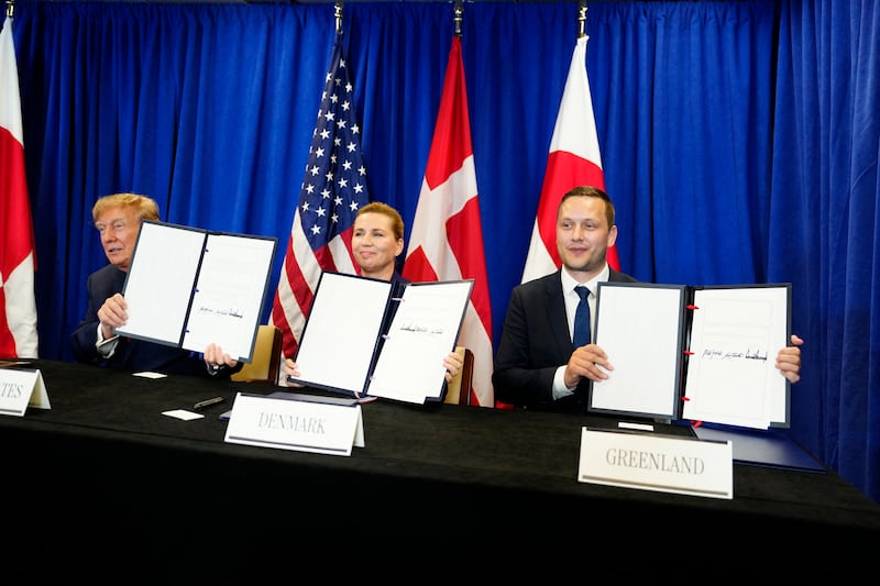 US president Donald Trump, Denmark's prime minister Mette Frederiksen and Greenland's prime minister Jens-Frederik Nielsen pose after they signed a trilateral security deal on the sidelines of the UNGA on Tuesday. Photo by Mads Claus Rasmussen/AFP via Getty Images