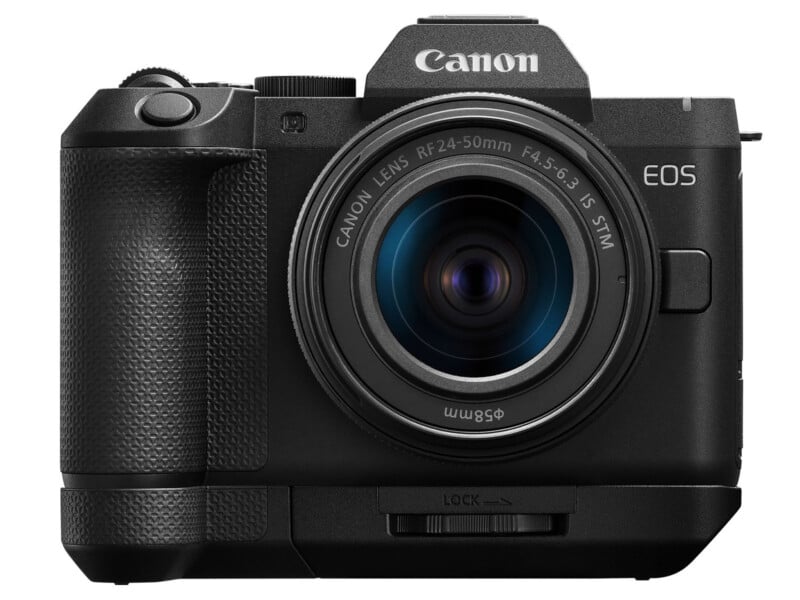 A front-facing Canon EOS mirrorless camera with an attached RF 24-50mm lens and a battery grip.